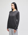 A long-sleeve t-shirt in dark grey, featuring a logo, displayed on a model with straight black hair.