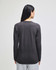 A long-sleeve t-shirt in dark grey with a plain back design and a subtle logo.