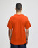 An orange Champion Adult Jersey Short Sleeve T-Shirt viewed from the back, featuring short sleeves.