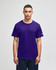 A purple Champion adult jersey short sleeve t-shirt with a logo on the sleeve.