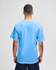 A light blue Champion adult jersey short sleeve t-shirt featuring a back view and a logo.
