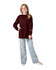 A youth wearing a long sleeve maroon t-shirt with light blue jeans, standing confidently with a slight smile.