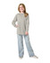 A youth long sleeve t-shirt in grey, paired with light blue jeans, featuring a logo on the sleeve.
