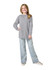 A grey long sleeve T-shirt is worn by a girl standing with her hands on her hips, paired with light blue jeans.