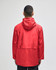 A red full-zip anorak jacket with a hood, featuring a back view and a logo. Suitable for rainy weather.