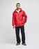 A red full-zip anorak jacket with a hood, featuring a front pocket and a branded logo.