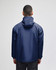 A navy blue packable anorak jacket featuring a hood and a logo on the back. Suitable for rain protection.