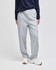 Light grey open-bottom fleece pants with pockets, featuring a relaxed fit and worn with a navy top and white shoes.