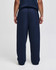 Navy blue open-bottom fleece pants with pockets, featuring a relaxed fit, viewed from the back.
