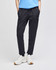 A pair of black fleece jogger pants with side pockets, styled with a light blue top and white shoes.