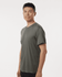 A men's performance t-shirt in a dark grey shade, featuring a logo on the chest.