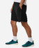 Men's Pro-Lock Performance Shorts in black, featuring pockets and a logo, paired with teal athletic shoes.