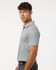 A men's short-sleeve polo in heather grey, featuring a collared neckline and a logo on the chest.