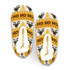 A pair of custom knitted slippers in yellow, white, and black featuring a festive pattern and a fuzzy lining.