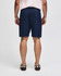 Navy blue gym shorts with an elastic waistband, featuring a logo. View shows the back side of the shorts.