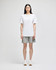 A model wearing grey cotton gym shorts and a white t-shirt, standing against a neutral background.