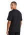 A black loose-fitting unisex t-shirt displayed on a model from the back, featuring a simple design and logo.