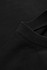 A close-up of a black oversized T-shirt made from 230gsm 100% organic cotton, featuring a simple neckline and fabric texture.