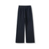A pair of unisex wide leg fleece pants in navy blue with an elastic waistband and no visible branding.