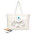 A large cream tote bag featuring a playful illustration with four cartoonish fish and a front pocket.