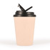 A reusable coffee cup in a light beige color with a black lid and handle. It features a logo.