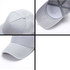 A grey heavy cotton sandwich cap with a curved brim and a logo on the front.