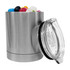 A stainless steel coffee mug with a clear lid, filled with colourful jelly beans.