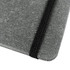 A grey notebook with a textured cover and a black elastic band closure. Features a logo on the cover.