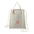 A grey drawstring bag made from recycled cotton, featuring a front pocket and a logo.
