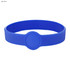 A light blue silicone wristband featuring a circular design. The band includes a logo or branding element.