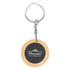 A round bamboo keyring with a silver metal chain and a circular black centre featuring a logo.