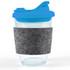 A reusable coffee cup featuring a clear body, a blue snap lid, and a gray RPET band for grip.