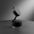 A black adjustable magnetic mobile stand with a round base and a swivelling top.