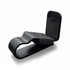 A black car visor sunglass holder with foam padding and a clip design for secure attachment.