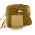 A large brown kraft paper storage bag with a squared base and a logo inside. The bag is held by a hand.