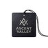 A car air freshener in a square design, featuring a black background and a logo in a silver finish.