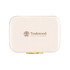 A cream-coloured cooler with a gold clasp and a logo. The design features a rectangular shape.