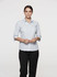 A light blue button-up shirt with 3/4 sleeves, featuring a collar and a logo. Suitable for women's wear.