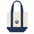 A mini canvas tote in cream and navy blue, featuring a circular logo with wave design.