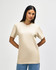 A midweight adult t-shirt in beige with short sleeves, featuring a logo on the front.
