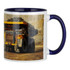 A ceramic mug featuring a blue handle and trim, with an image of a mining truck on one side.
