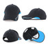 A black cap with blue accents, featuring a structured design and a logo on the front.