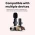 A wireless microphone in black, designed for compatibility with multiple devices like phones and cameras, featuring a sleek design.