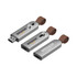A silver flash drive with a brown strap and a logo, featuring USB connectors on both ends.
