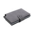 A grey vegan leather wallet with a button clasp and a slim design. It features a logo on the front.