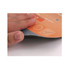 An orange and grey ultra-thin PVC mouse pad with a person’s hand resting on it, showcasing its flexibility.