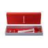 A red gift box containing a multi-connector charging cable with a keyring attachment. Includes a logo.