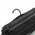 A black toiletry bag featuring a hook for hanging and a sleek design, brand logo visible.