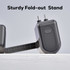 A black power bank with a sturdy fold-out stand and USB port, designed for convenience and portability.