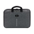 A laptop case in grey fabric with black handles and a logo tag. Features a zip closure and a sleek design.